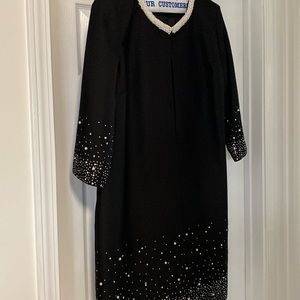 Black knee length dining jacket
Brand new Never worn